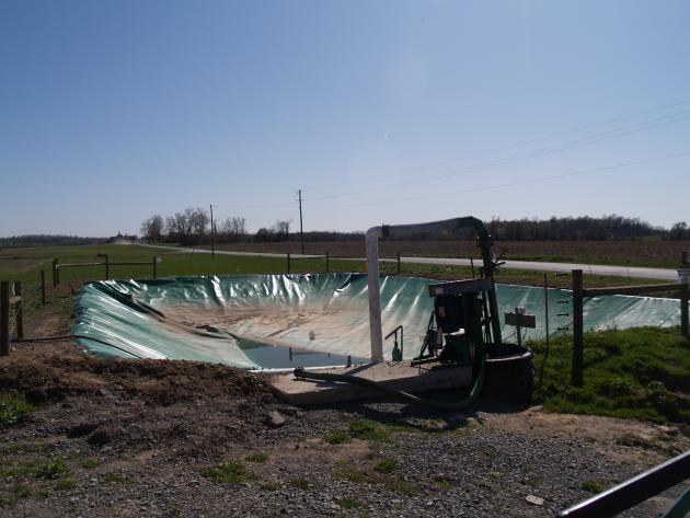 a small manure storage structure with a cover installed