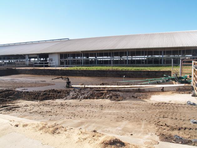 A cement slurry manure storage structure on a dairy farm.
